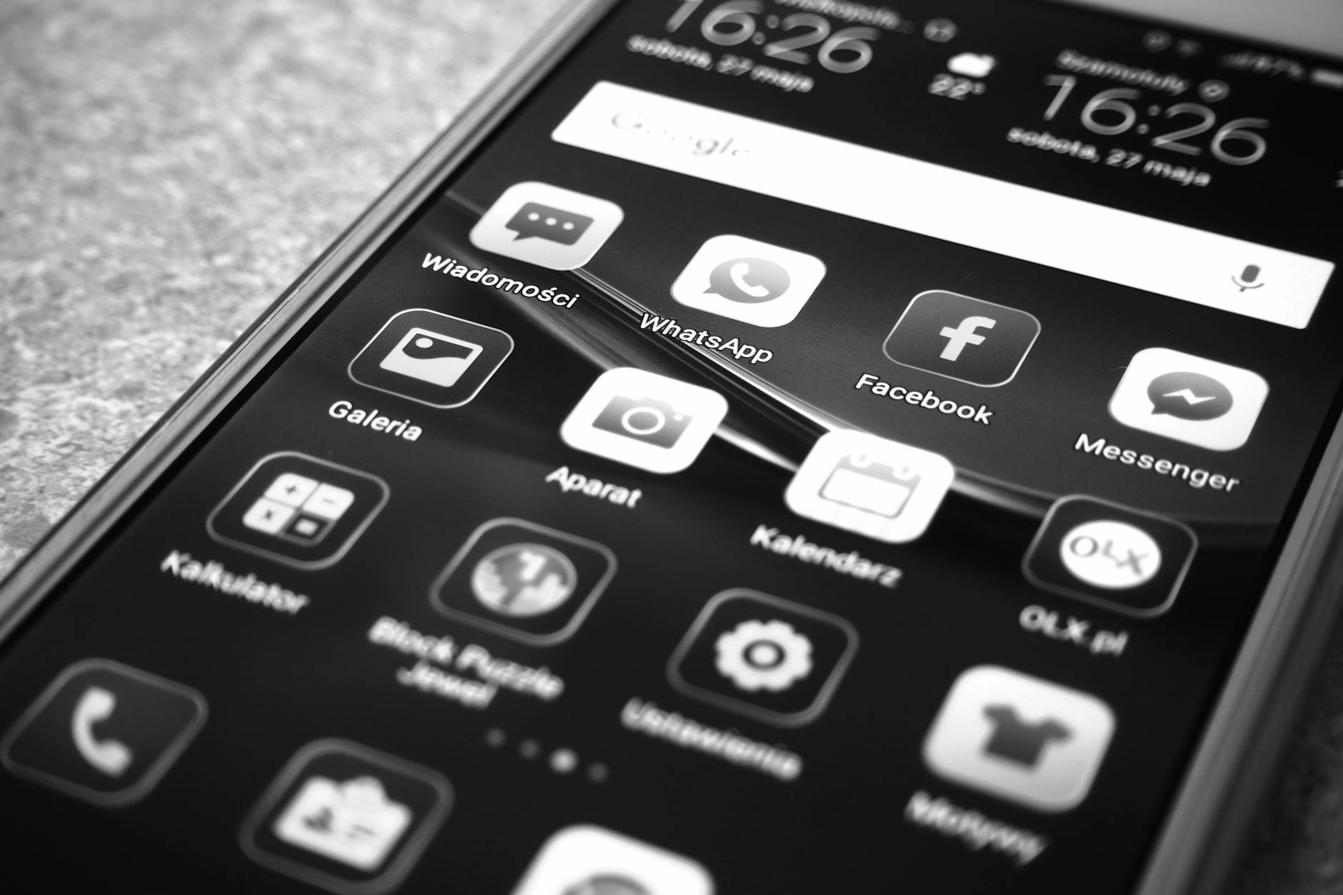 A close-up of an iPhone screen showing a calm, minimalist app interface