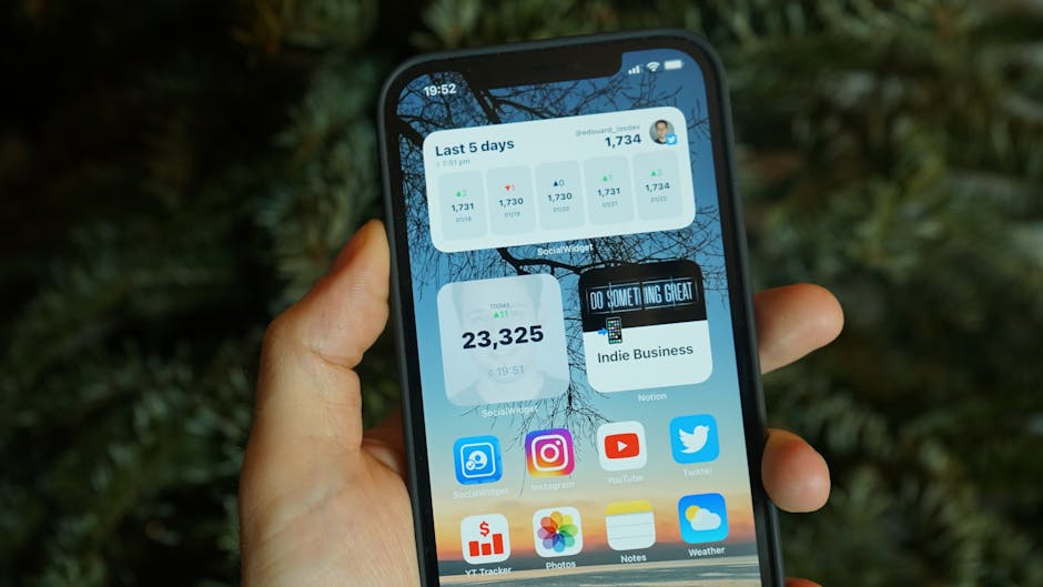 Close-up of an iPhone home screen showing a minimal planning app widget with clean typography