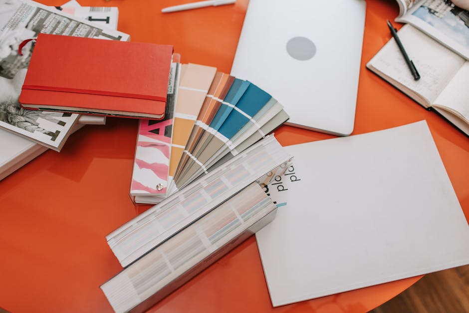 A creative workspace with colorful organization tools and notebooks