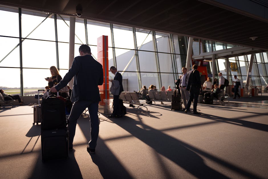 A traveler with a suitcase at the airport, ready for departure